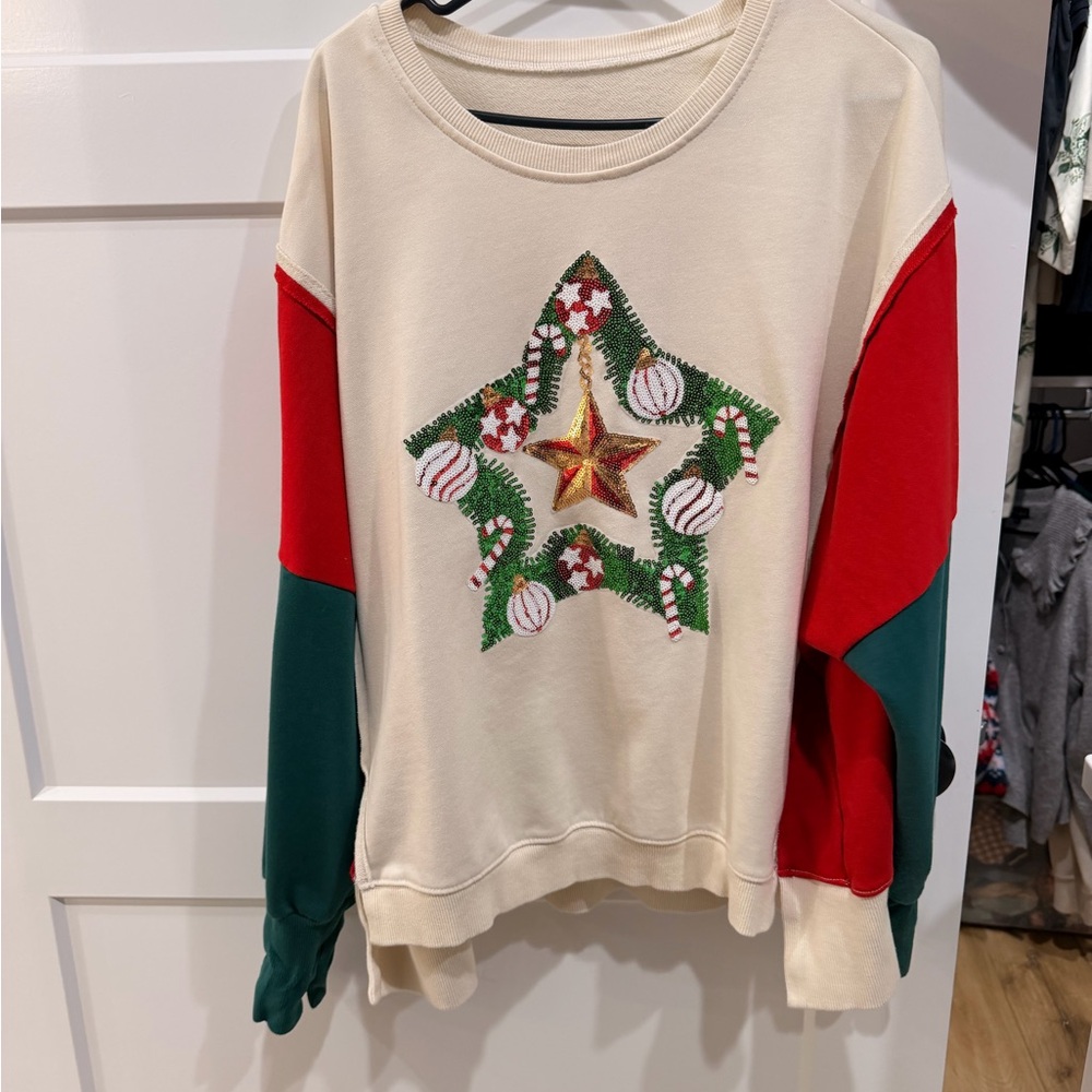 Festive Star Sweatshirt with Red and Green Sleeves